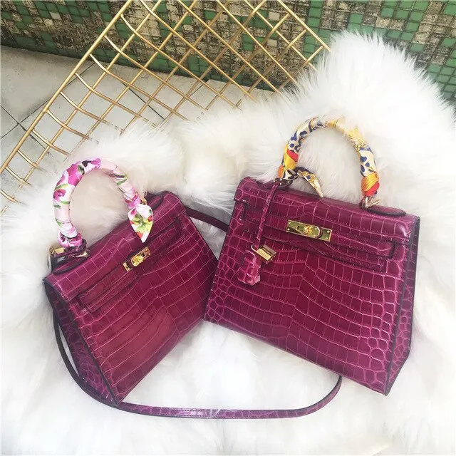 2019 new genuine leather luxury design handbag Keyy ostrich grain cowhide women's bag Original leather shoulder diagonal package